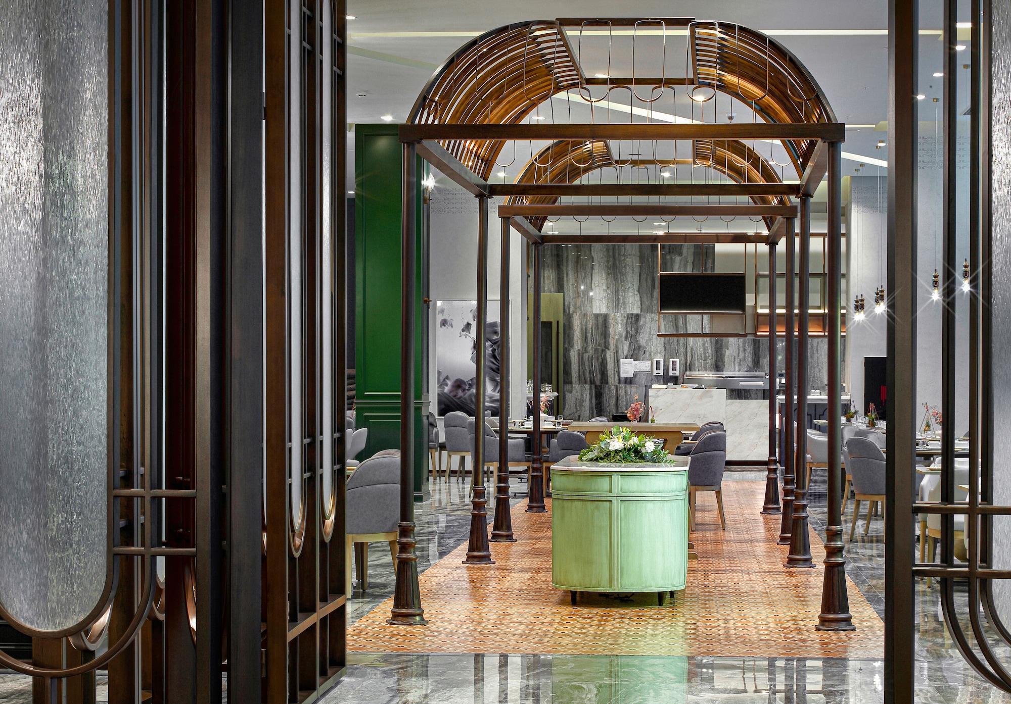 Wanda Vista Istanbul Hotel Bagian luar foto The interior of the restaurant