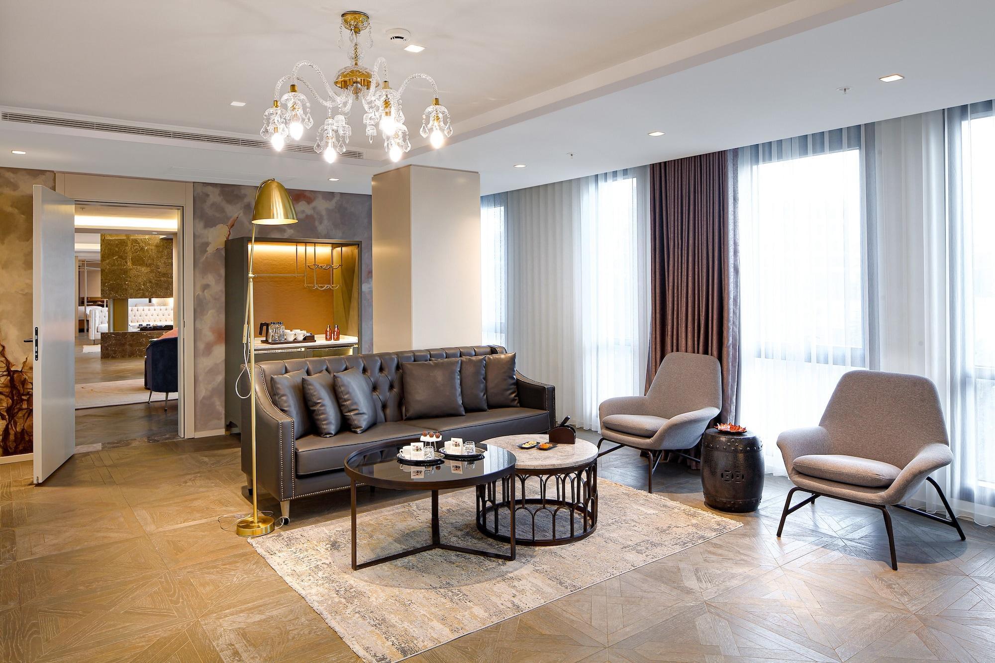 Wanda Vista Istanbul Hotel Bagian luar foto The living room of a three-bedroom apartment at The Ritz-Carlton, DIFC