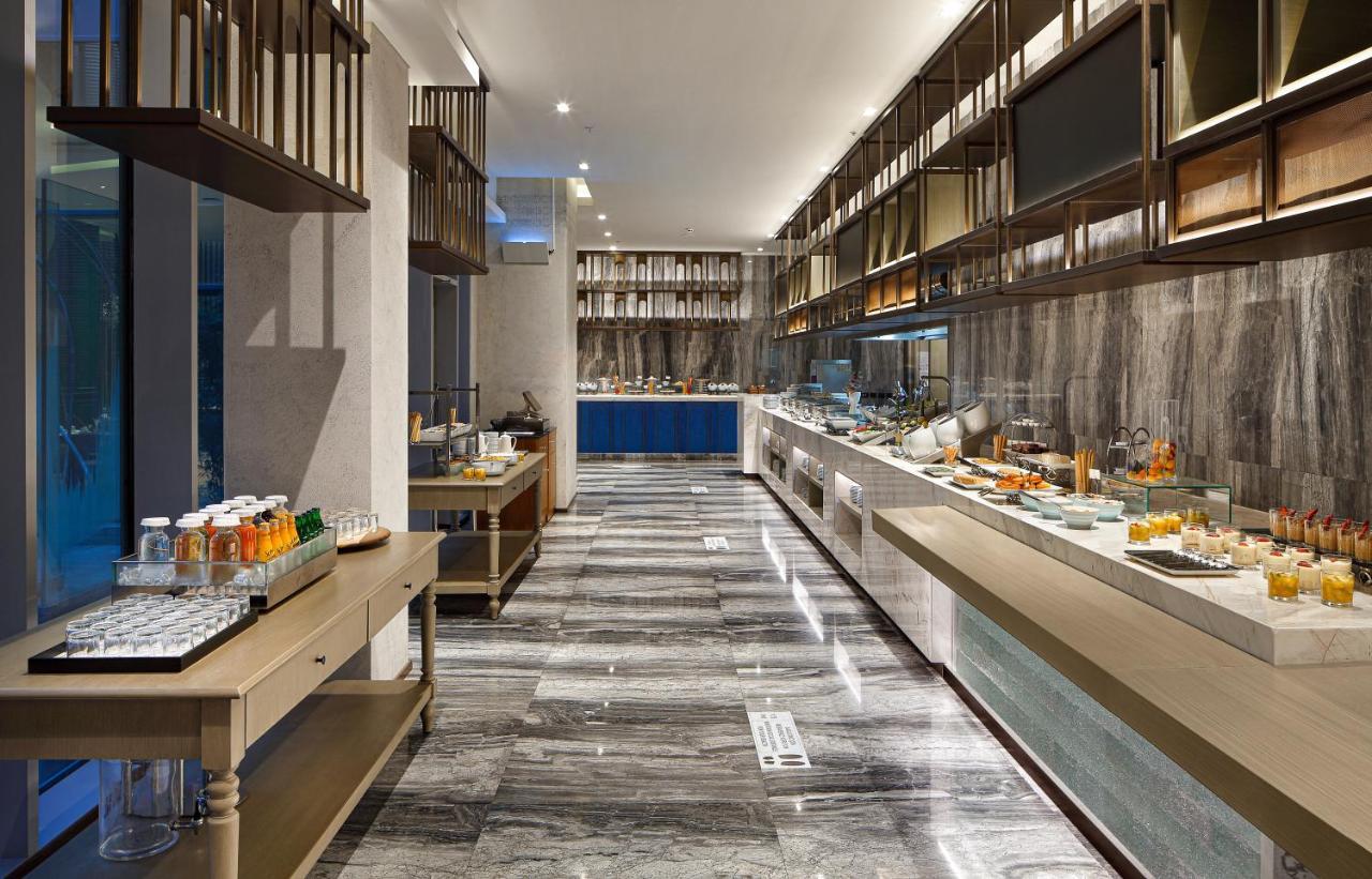 Wanda Vista Istanbul Hotel Bagian luar foto The buffet at the hotel